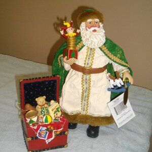 Possible Dreams Clothtique Holiday Treasure Santa figurine.